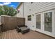 Back deck features an outdoor seating area with privacy provided by a wood fence at 3014 Liberty Nw Way, Atlanta, GA 30318