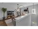 Open-concept living room offers a versatile space with stylish decor and natural light at 3014 Liberty Nw Way, Atlanta, GA 30318