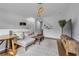 Sun-filled living room with neutral decor, decorative lighting and hardwood floors at 3014 Liberty Nw Way, Atlanta, GA 30318