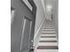 Freshly painted stairway leads to the second floor of the house at 3014 Liberty Nw Way, Atlanta, GA 30318