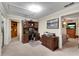 Comfortable bedroom featuring an office space, carpet, and neutral-colored walls at 435 Old Holly Rd, Milton, GA 30075