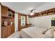 Bedroom features built-in shelves and cabinets, adding character and storage at 435 Old Holly Rd, Milton, GA 30075