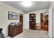 Bedroom with a view to another room showing off neutral walls and carpet at 435 Old Holly Rd, Milton, GA 30075