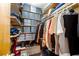 Walk-in closet featuring built-in shelving and rack systems at 435 Old Holly Rd, Milton, GA 30075