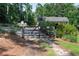 Private property entrance with secure gate, ensuring peace of mind and exclusivity at 435 Old Holly Rd, Milton, GA 30075