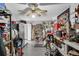 Spacious garage with abundant storage, work surfaces, and a ceiling fan for comfortable DIY projects at 435 Old Holly Rd, Milton, GA 30075
