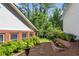 Beautifully landscaped backyard with stone path and well-maintained greenery at 435 Old Holly Rd, Milton, GA 30075