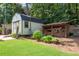 Well-maintained shed with firewood storage, ideal for keeping your property organized at 435 Old Holly Rd, Milton, GA 30075