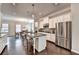 Bright kitchen with stainless steel appliances and a center island at 711 Topsail Ln, Alpharetta, GA 30005