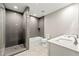 Modern bathroom with tiled shower, soaking tub, and double sink vanity at 4110 Oak Ferry Ne Dr, Kennesaw, GA 30144