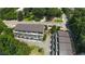 Aerial view of townhomes surrounded by lush trees in a desirable community location at 5836 Sandy Springs Cir, Atlanta, GA 30328