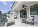 Spacious outdoor balcony featuring seating and a ceiling fan at 5836 Sandy Springs Cir, Atlanta, GA 30328