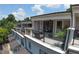 This home features a covered balcony with wrought iron railing, perfect for outdoor living and entertaining at 5836 Sandy Springs Cir, Atlanta, GA 30328