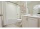 Bathroom showcasing white cabinetry, a modern sink, and a shower-tub combination at 5836 Sandy Springs Cir, Atlanta, GA 30328