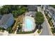 Aerial view of a refreshing community pool with lounge chairs and well-maintained landscaping for resident enjoyment at 5836 Sandy Springs Cir, Atlanta, GA 30328