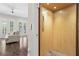 Modern interior featuring a residential elevator adjacent to a cozy living area with French doors at 5836 Sandy Springs Cir, Atlanta, GA 30328