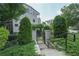 Charming gated entrance with stone steps leading to the property's entrance at 5836 Sandy Springs Cir, Atlanta, GA 30328