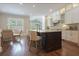 Beautiful kitchen featuring a center island with bar seating and modern appliances at 5836 Sandy Springs Cir, Atlanta, GA 30328