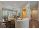 Cozy living room featuring hardwood floors, modern furniture, and convenient elevator access at 5836 Sandy Springs Cir, Atlanta, GA 30328