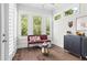 Bright sitting room with hardwood floors, plantation shutters, and stylish decor at 5836 Sandy Springs Cir, Atlanta, GA 30328