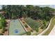 Community sports courts include basketball and soccer for active residents, set amongst lush landscaping and shady trees at 5836 Sandy Springs Cir, Atlanta, GA 30328