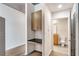 Hallway featuring a built-in desk and storage, plus access to the en-suite bathroom at 860 Peachtree Ne St # 1912, Atlanta, GA 30308