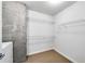 Laundry room with wire shelving and convenient access at 860 Peachtree Ne St # 1912, Atlanta, GA 30308