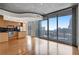 Bright living space with hardwood floors, open to kitchen with stainless steel appliances and a stunning city view at 860 Peachtree Ne St # 1912, Atlanta, GA 30308