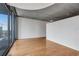 Bright living area with hardwood floors and a view of the city skyline at 860 Peachtree Ne St # 1912, Atlanta, GA 30308