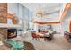Inviting lounge area with a fireplace, comfortable seating, and ample natural light for relaxing or socializing at 860 Peachtree Ne St # 1912, Atlanta, GA 30308