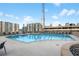 Rooftop swimming pool with lounge chairs and city skyline views, perfect for relaxation and recreation at 860 Peachtree Ne St # 1912, Atlanta, GA 30308