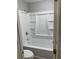 Bathroom featuring a combined tub and shower unit with built-in shelving at 1150 Rankin Street # D1, Stone Mountain, GA 30083
