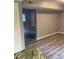 Inviting living room featuring wood-look flooring and neutral gray paint at 1150 Rankin Street # D1, Stone Mountain, GA 30083