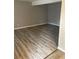 Neutral living room with wood-look flooring at 1150 Rankin Street # D1, Stone Mountain, GA 30083