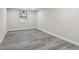 Finished basement featuring stylish gray flooring and a bright window at 2349 Springdale Rd, Atlanta, GA 30315