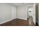 Spacious bedroom with wood floors, a closet, and an open door to bathroom at 2349 Springdale Rd, Atlanta, GA 30315