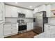 Gourmet kitchen features stainless steel appliances and granite countertops at 2349 Springdale Rd, Atlanta, GA 30315