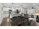 Open living room features updated kitchen, providing an inviting space for dining and entertaining at 2349 Springdale Rd, Atlanta, GA 30315