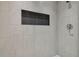 Stylish walk-in shower with a built-in niche and modern fixtures at 2349 Springdale Rd, Atlanta, GA 30315