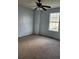 Bedroom with carpet and ceiling fan, featuring natural light at 3059 Brass Dr, Austell, GA 30106