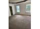 Spacious bedroom featuring natural light, and a double tray ceiling at 3059 Brass Dr, Austell, GA 30106