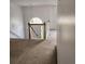 View of the staircase with natural light and carpet leading upstairs at 3059 Brass Dr, Austell, GA 30106
