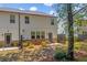 View of the home's backyard, patio, and fenced in yard at 4098 Haleston Rd, Duluth, GA 30097