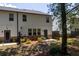 View of the home's backyard, showcasing a small patio area and partial fencing at 4098 Haleston Rd, Duluth, GA 30097