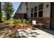 Backyard patio area with seating, ideal for outdoor relaxation at 4098 Haleston Rd, Duluth, GA 30097
