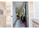 Stylish entryway with decorative rug, furniture, and view into the living area at 4098 Haleston Rd, Duluth, GA 30097