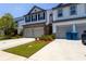 Well-maintained townhouse with an attached garage and a neatly kept lawn at 4098 Haleston Rd, Duluth, GA 30097