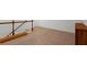 Upstairs hallway has neutral carpet and white walls at 4098 Haleston Rd, Duluth, GA 30097