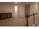Neutral, carpeted loft area with natural lighting at 4098 Haleston Rd, Duluth, GA 30097