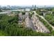 Aerial view of a neighborhood with a community pool nestled among lush greenery and residential buildings at 6459 Chariot St # 35, Atlanta, GA 30328